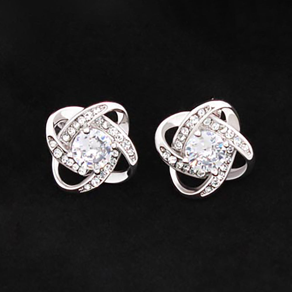 Love Knot Stud Earrings – 14K White Gold Finish & Cubic Zirconia